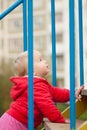 Baby crawl up the stairs on playground Royalty Free Stock Photo