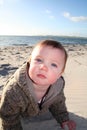 Baby crawling on beach Royalty Free Stock Photo