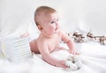 Baby in diaper on a white background Royalty Free Stock Photo