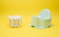 Baby diapers and potty Royalty Free Stock Photo