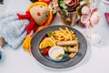 Baby dish, chicken sausages with french fries Royalty Free Stock Photo