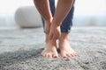 Baby doing first steps with mother`s help