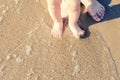 Baby doing his first steps on the beach Royalty Free Stock Photo