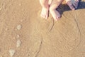 Baby doing his first steps on the beach Royalty Free Stock Photo