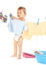 Baby doing laundry Royalty Free Stock Photo