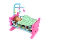 Baby Doll in Bed Royalty Free Stock Photo