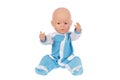 baby doll in blue overalls sits on the pope raising his hands up isolated on a white background Royalty Free Stock Photo