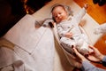 The baby dress up in clothes on the table in the Church. ordinance of baptism.