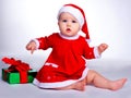 Baby dressed as Santa