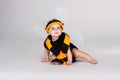 Baby dressed in a bee costume