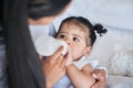 Baby drink bottle, formula and nutrition with feeding and family, healthy and growth with early childhood development Royalty Free Stock Photo