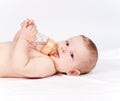 Baby drinking compot from bottle