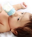 Baby drinking milk Royalty Free Stock Photo