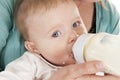 Baby drinking milk Royalty Free Stock Photo