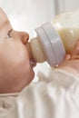 Baby drinking milk Royalty Free Stock Photo