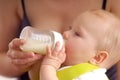 Baby drinking milk Royalty Free Stock Photo