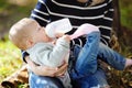 Baby drinking milk from bottle Royalty Free Stock Photo