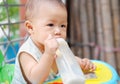 Baby drinking milk Royalty Free Stock Photo