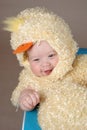 Baby in easter chick costume Royalty Free Stock Photo