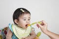 Baby eating baby food Royalty Free Stock Photo