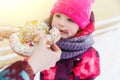 Baby eating bun in park Royalty Free Stock Photo