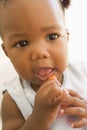 Baby eating carrot Royalty Free Stock Photo