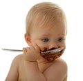 Baby eating chocolate Royalty Free Stock Photo