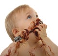 Baby eating chocolate Royalty Free Stock Photo