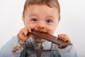 Baby eating chocolate Royalty Free Stock Photo