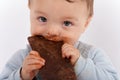 Baby eating chocolate Royalty Free Stock Photo