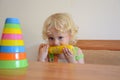 Baby eating corn