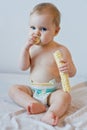 Baby eating crisps Royalty Free Stock Photo