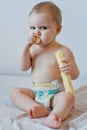 Baby eating crisps Royalty Free Stock Photo