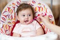 Baby eating food with mother help Royalty Free Stock Photo