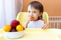 Baby eating fruits Royalty Free Stock Photo