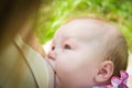 Baby eating mother`s milk. Mother breastfeeding baby. Beautiful mom breast feeding her newborn child Royalty Free Stock Photo