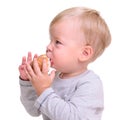 Baby eats bread Royalty Free Stock Photo