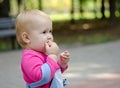 Baby eats a bun