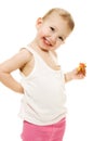 Baby eats candy on a white background