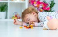 Baby eats jelly candies at home. Selective focus. Royalty Free Stock Photo