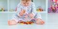 Baby eats jelly candies at home. Selective focus. Royalty Free Stock Photo