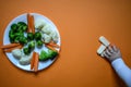 Baby eats vegetables and cookies