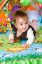 Baby in educational mat