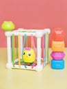 baby educational toy, a multi-colored cube. Development of fine motor skills and logical thinking. stacking pieces of a