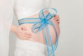 Baby expecting abdomen pregnant ribbon boy