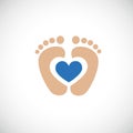 Baby feet footprint with blue heart
