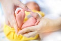 Baby feet in mother hands - hearth shape, Baby feet in mother hands. Mom and her Child. Happy Family concept. Beautiful conceptual Royalty Free Stock Photo