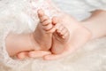 Baby feet in mother hands. Mom and her child. Happy family concept. Beautiful conceptual image of Maternity Royalty Free Stock Photo