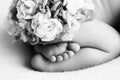 Baby feet. The tiny foot of a newborn in soft selective focus. Black and white image of the soles of the feet. Royalty Free Stock Photo