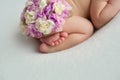 Baby feet. The tiny foot of a newborn in soft selective focus. Image of the soles of the feet. Royalty Free Stock Photo